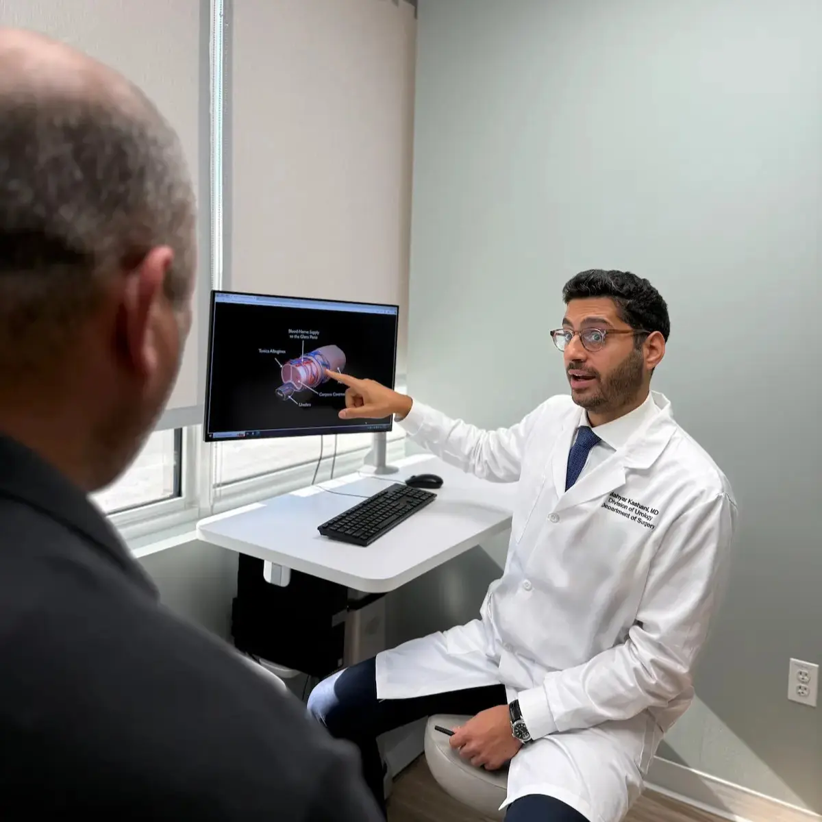 Dr. Mahyar Kashani consulting on penile implant options, Rockville Centre Long Island