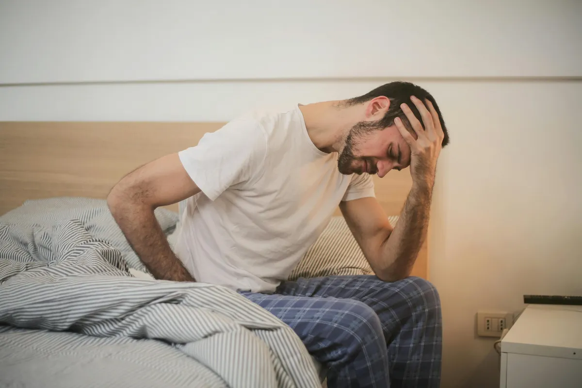 Man experiencing erectile dysfunction symptoms seeking urologist Long Island