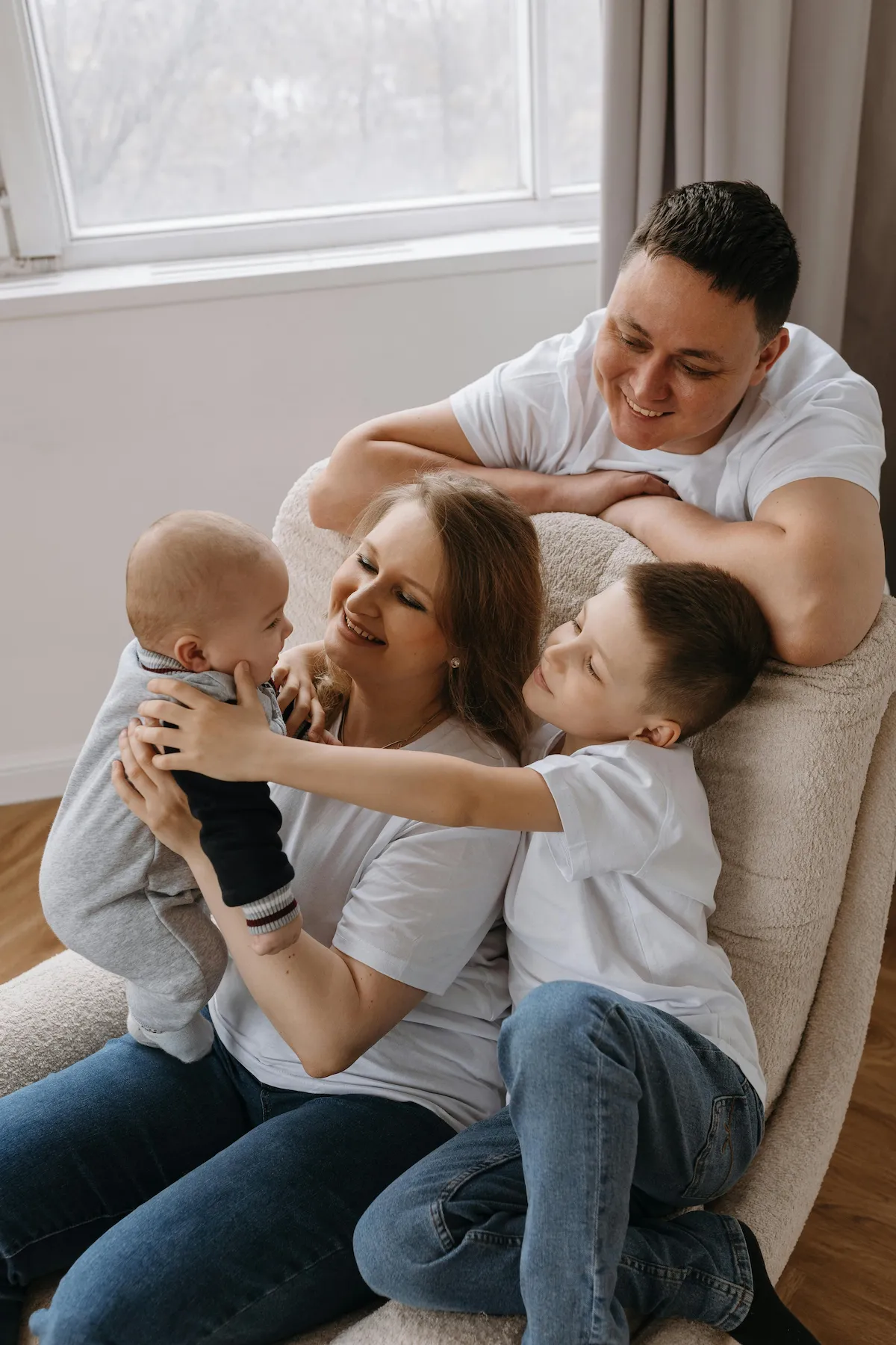 Family consulting with Dr. Mahyar Kashani about vasectomy reversal, Long Island New York